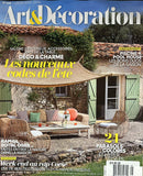 Art & Decoration Magazine cover featuring a rustic outdoor patio with colorful furniture and summer home decor inspiration from Provence