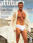 Attitude UK Magazine cover featuring Luke Evans in a white coat with headlines about his interview and LGBTQ culture magazines