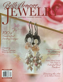 Belle Armoire Jewelry Magazine cover featuring handcrafted floral earrings with ceramic beads and jewelry design headlines in soft pink and cream tones