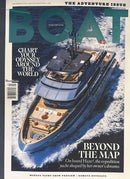 Boat International Magazine cover featuring a luxury yacht cruising through blue ocean water with headlines about global yachting adventures and onboard expeditions