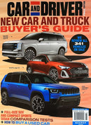 Car and Driver Magazine cover featuring three colorful vehicles and headlines about new car and truck buying guides and comparison tests