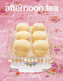 Afternoon Tea by frankie magazine cover showing six powdered sandwich cookies on a glass serving tray over a pink floral tablecloth