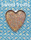 Sweet Treats by frankie magazine cover showing a heart shaped sprinkle cookie on blue floral patterned fabric with colorful dessert sprinkles and bold white lettering
