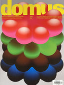 Domus Magazine cover featuring bold yellow lettering and layered colorful flower shaped forms in pink green brown and blue tones