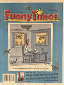 Funny Times Magazine cover featuring a whimsical illustrated office scene with flying drones and bold colorful lettering plus humorous newspaper style headlines