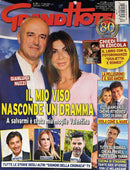 Grand Hotel Magazine cover featuring a smiling man and woman with bold Italian headlines and smaller celebrity story panels about television personalities