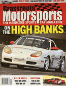 Grassroots Motor Sports Magazine cover featuring a white Porsche race car on track with headlines about high banks racing and motorsports magazines