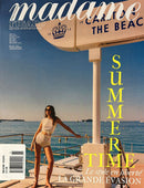 Madame Figaro French Magazine cover featuring a woman beside the sea under a beach umbrella with bold yellow Summer Time lettering and French cover text