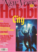 New York Magazine cover with a pink and red design featuring the headline Happy City and a nighttime street scene with people walking in rain