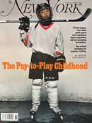 New York Magazine cover featuring a young ice hockey goalie in full gear with the headline The Pay to Play Childhood and a feature about youth sports costs