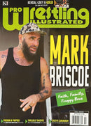 Pro Wrestling Illustrated Magazine cover featuring wrestler Mark Briscoe in a camouflage cap with bold yellow headlines and wrestling news teasers