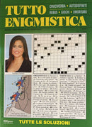 Tutto Enigmistica Magazine cover featuring crossword puzzles, a portrait, cartoon illustrations, and game solutions in Italian