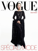 Vogue France Magazine cover featuring Gigi Hadid in a long black lace gown against a white background with bold fashion cover typography