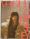 Vogue Korea Magazine cover featuring a model with long dark hair in a fur coat against a warm textured backdrop with bold red typography